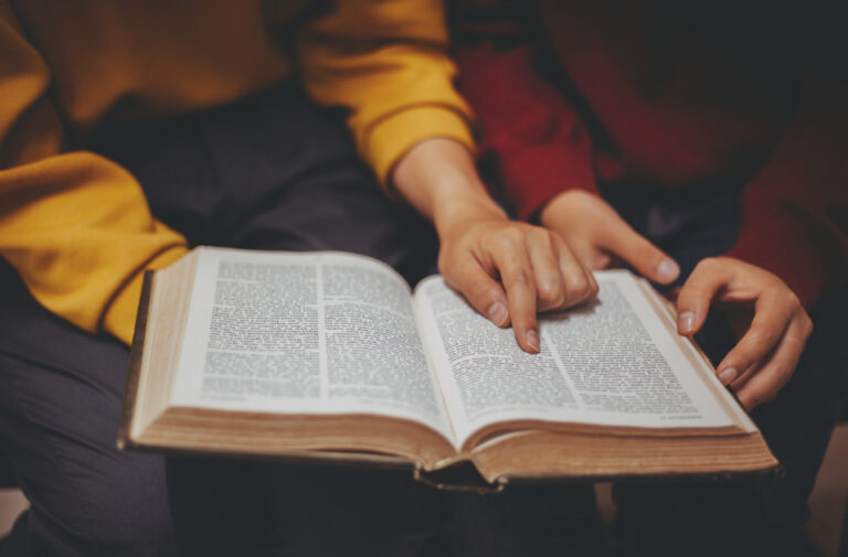 Two,Women,Studying,The,Bible.